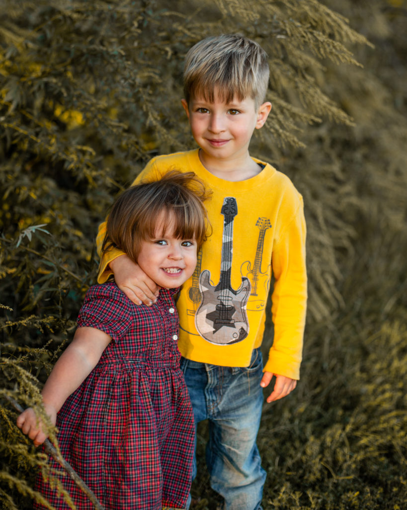 brother and sister at a family session photography posing