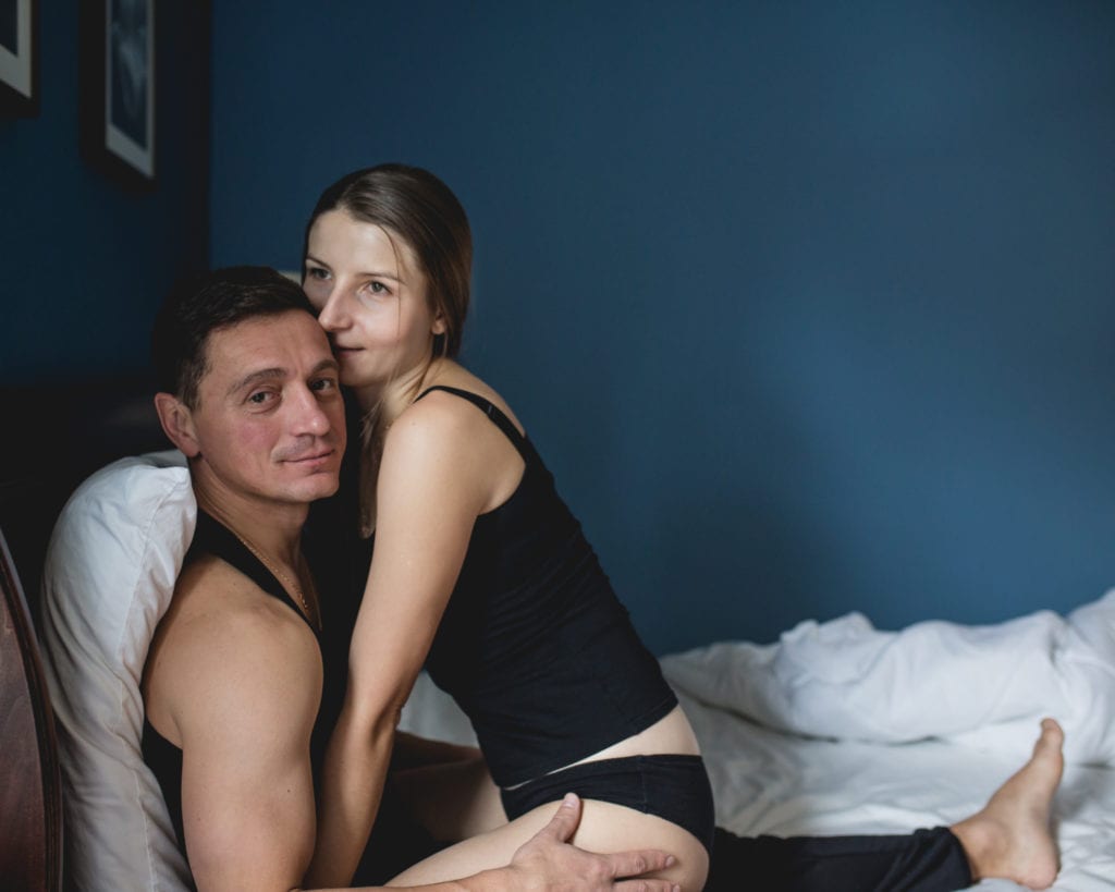 Couple's boudoir photoshoot bedroom