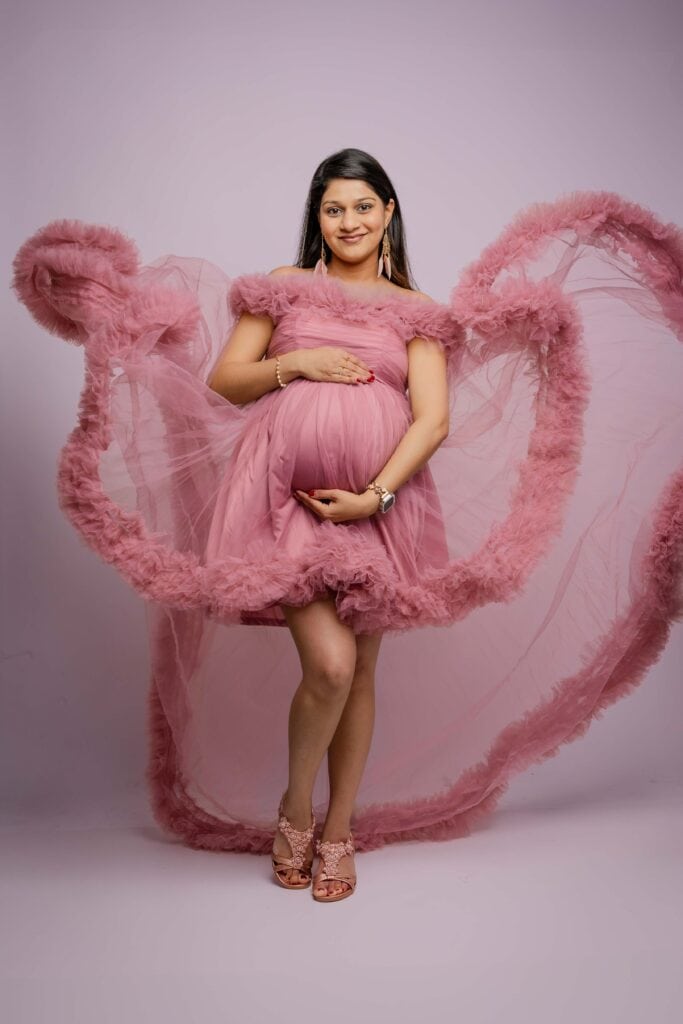 Studio maternity photoshoot Farmington CT in pink dress
