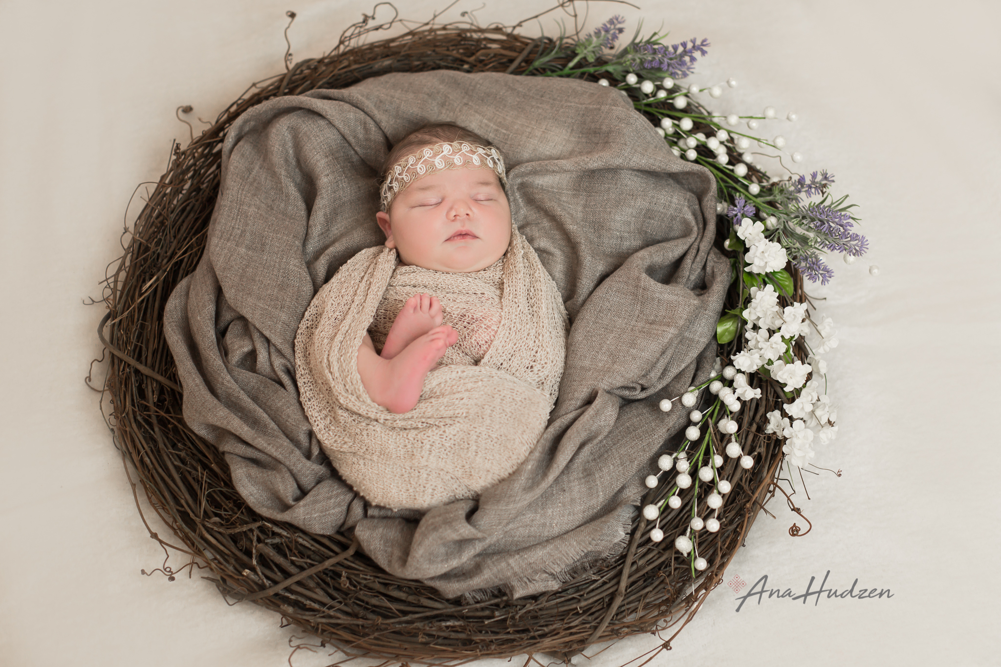 newborn photography family posing in white and gray Wethersfield ct baby in wreath