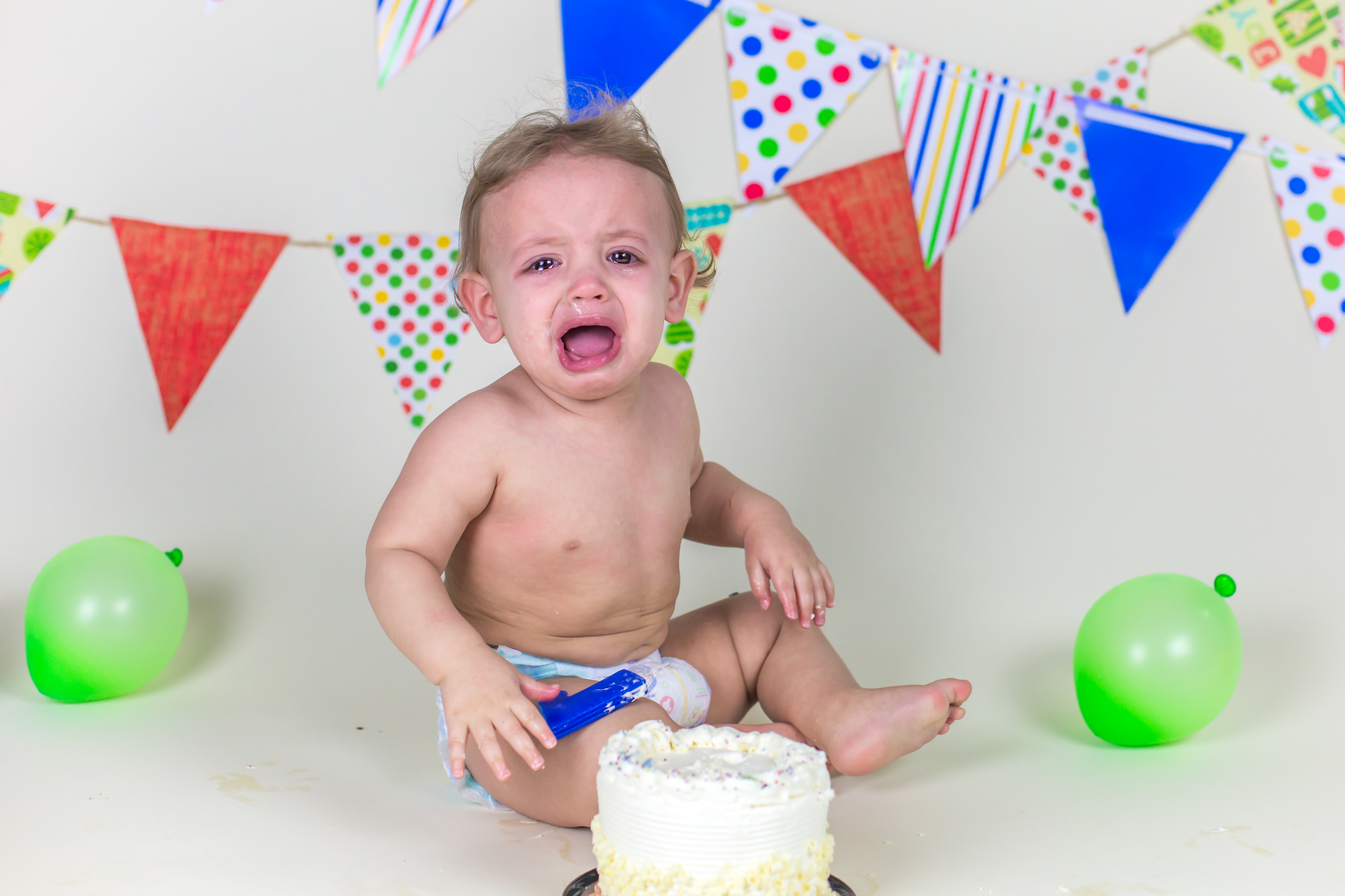 baby cake smash first year photography Eric carle theme farmington CT hungry caterpillar baby crying