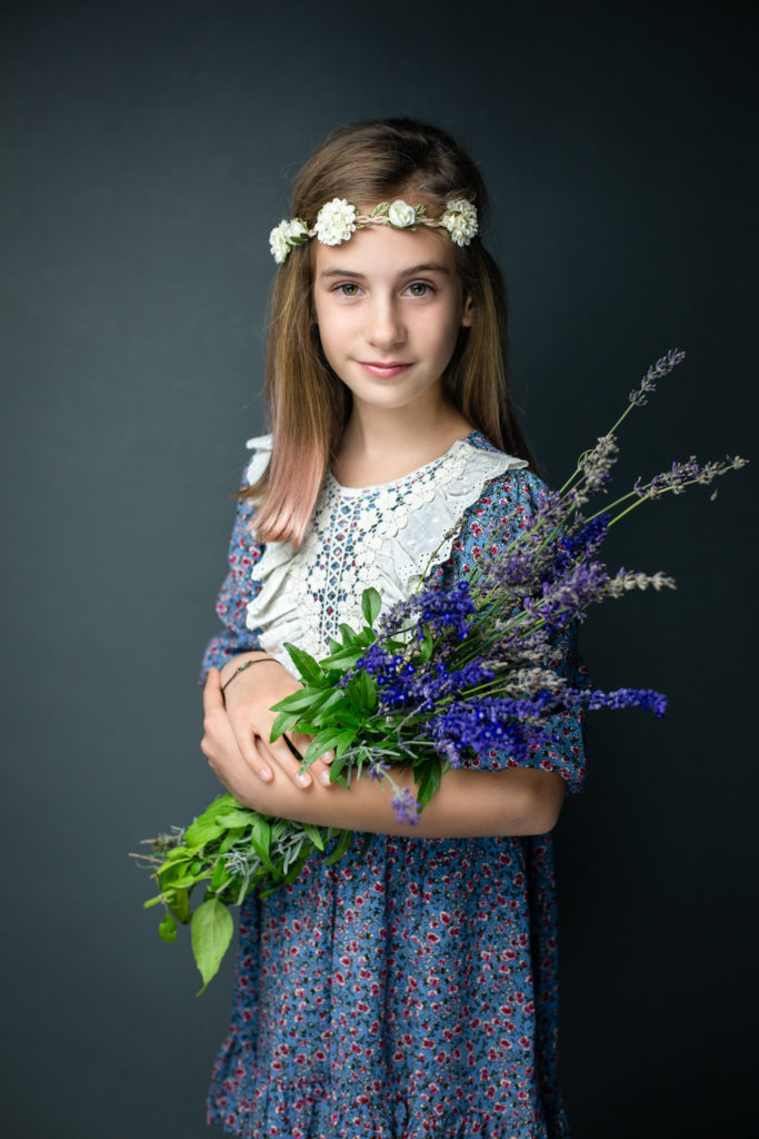 a girl with lavender flowers classic fine art soul child girl portrait farmington ct