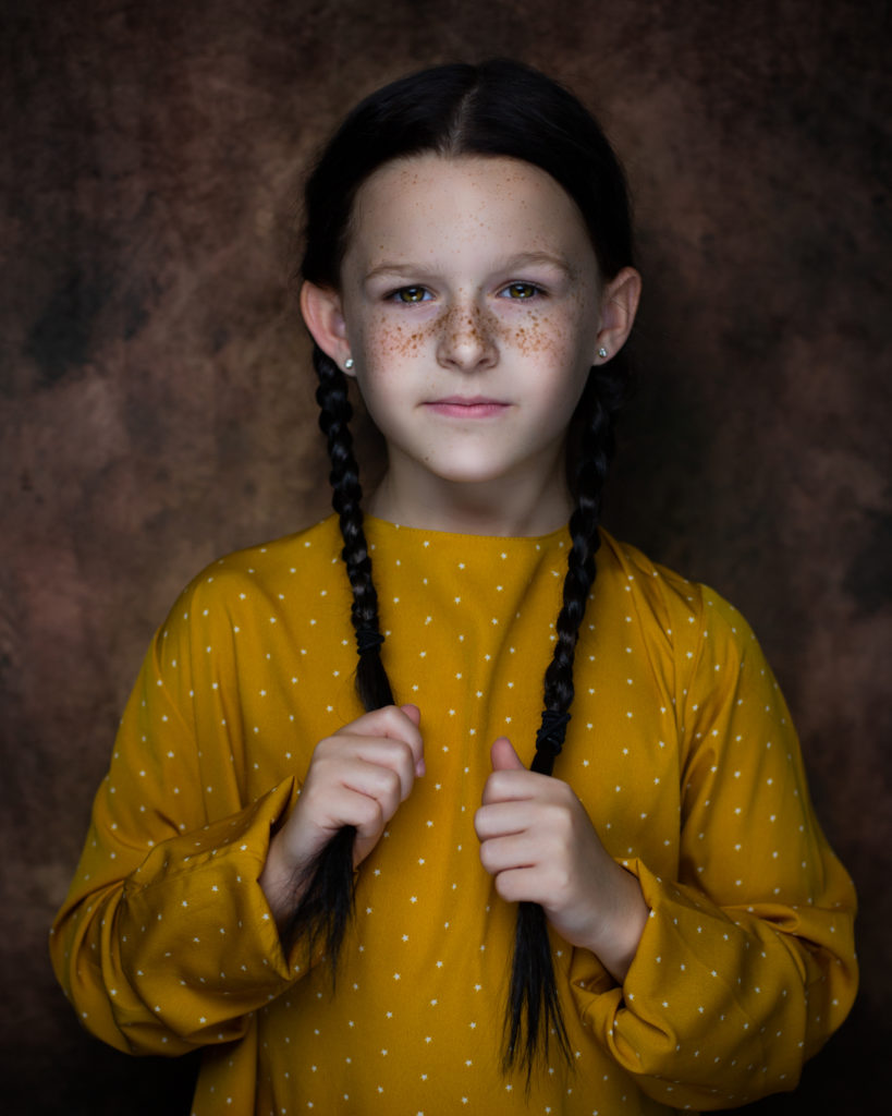 fine art classic soul child girl portrait yellow brown girl holding braids Farmington ct