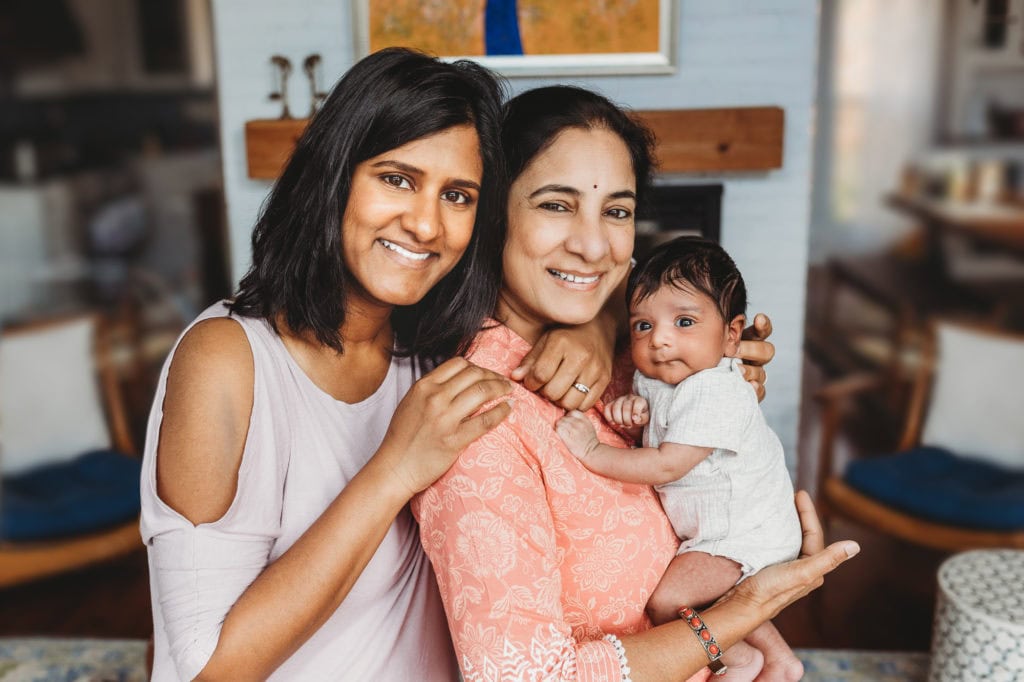 newborn posing with grandmother Indian traditional