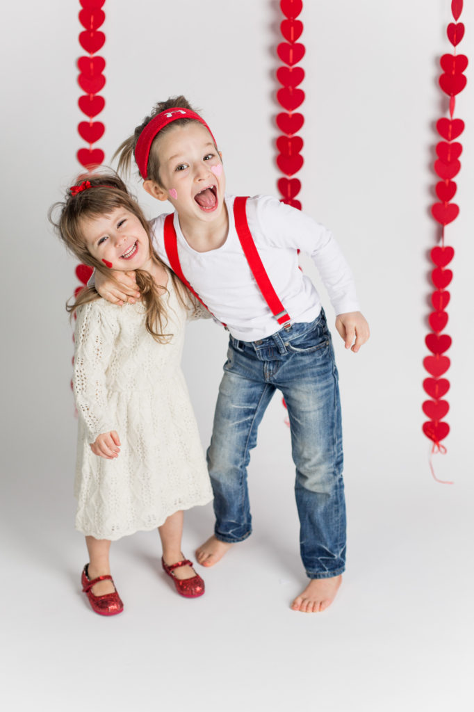 brother and sister siblings valentines kids hearts white background