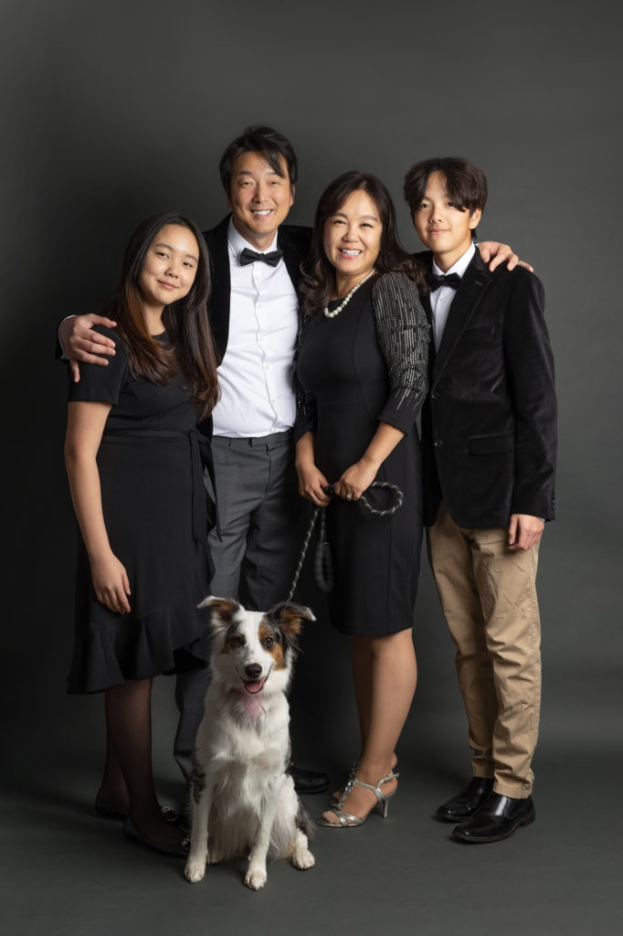 asian family portrait with a dog