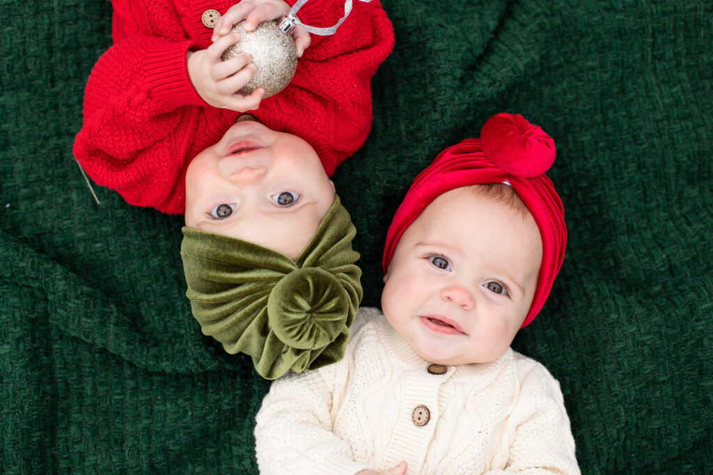 twin baby girls wearing turbans at a Christmas mini sessions