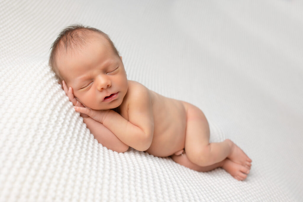 newborn baby naked cute on white, newborn photographer