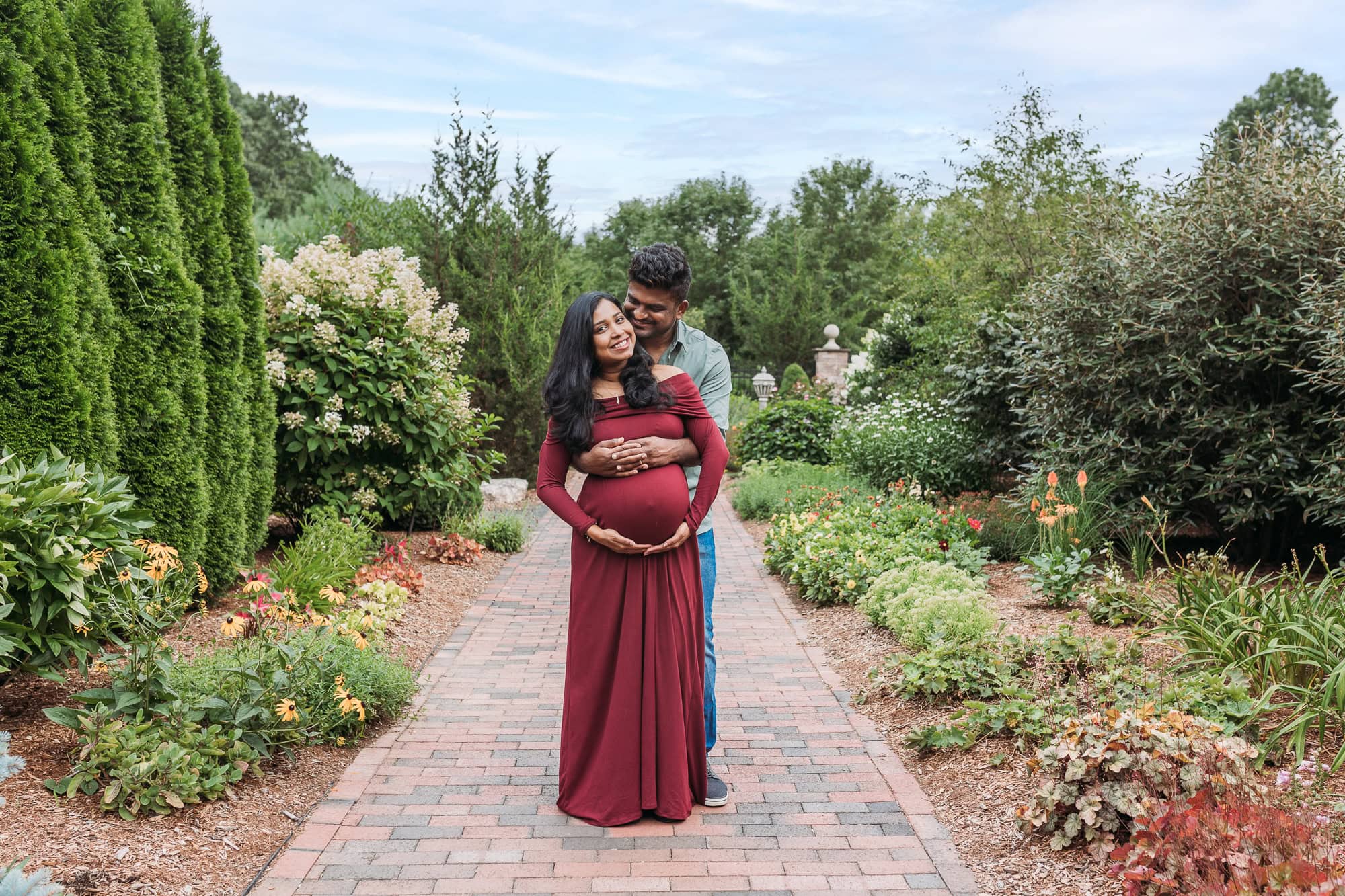 newborn photography baby girl in white posing Farmington ct huck Finn pose