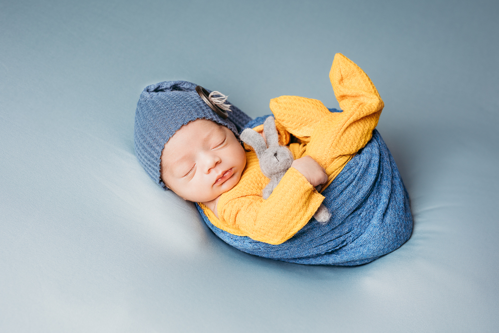 newborn photoshoot, newborn photographer farmington, CT, maternity photoshoot, newborn boy in yellow and blue