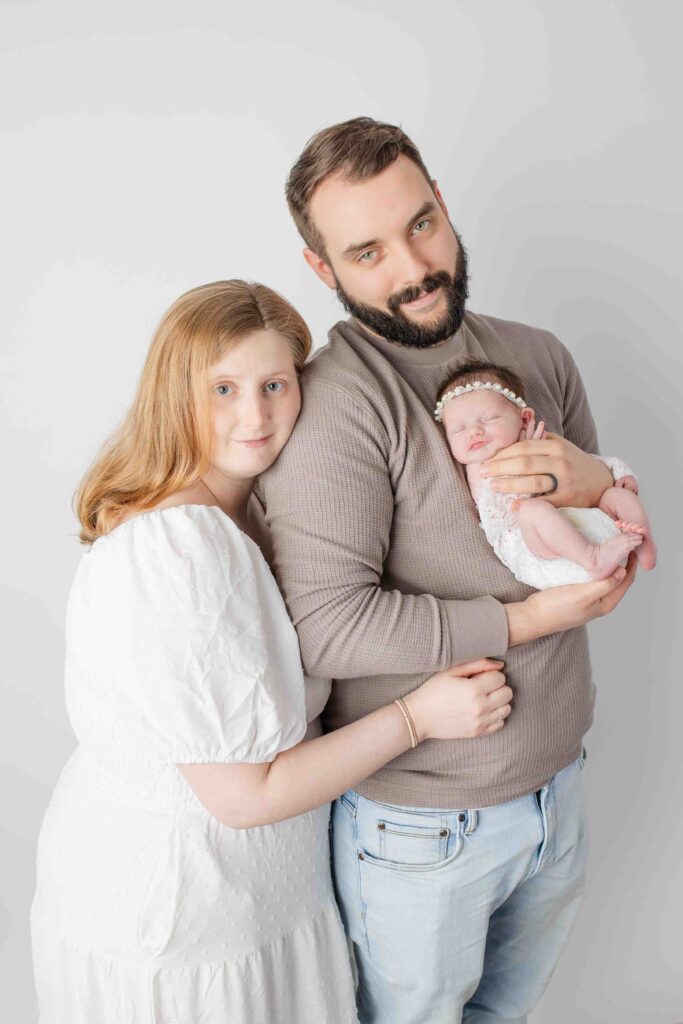 newborn photoshoot in studio with parents, newborn photographer Farmington CT